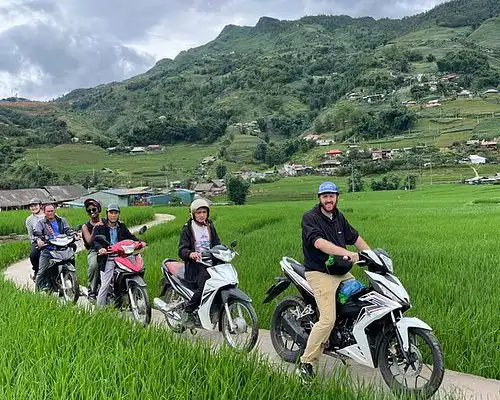 Motorbike tour on a mountain pass above the Sapa valleys